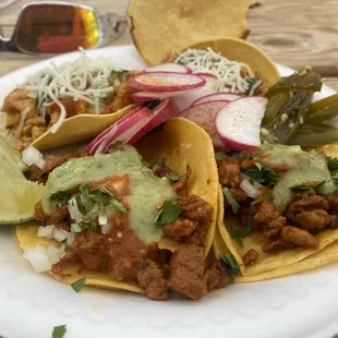 2 pork tacos, 2 chicken vampiros tacos