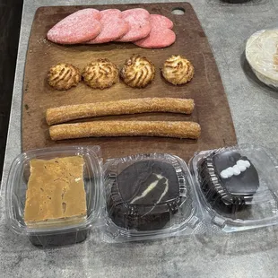 Flan topped chocolate cake, chocolate cake roll, chocolate cupcake, Churros, Coconut Macaroons &amp; Sugar Heart cookies