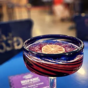 a glass of wine on a table