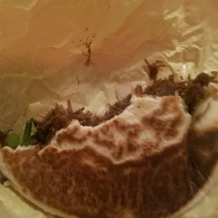 Barbacoa gordita munched on