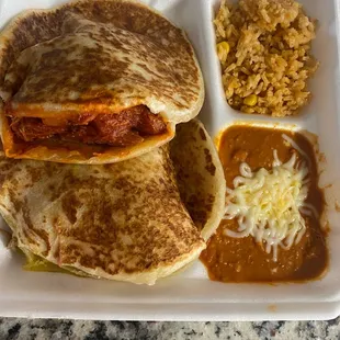 a meal in a styrofoam container