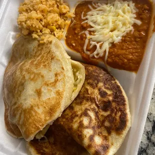a meal in a styrofoam container