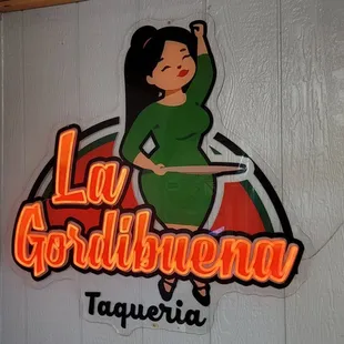 a woman in a green dress