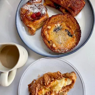 a plate of french toast and a cup of coffee