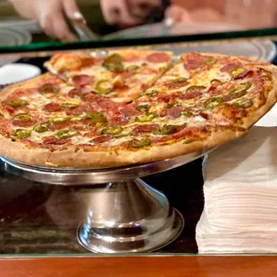 pepperoni, jalapenos, and other toppings