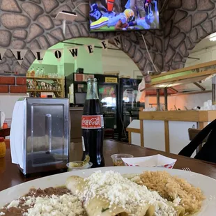 Chicken Enchiladas and the chips and salsa bar