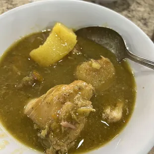 a bowl of soup and a spoon