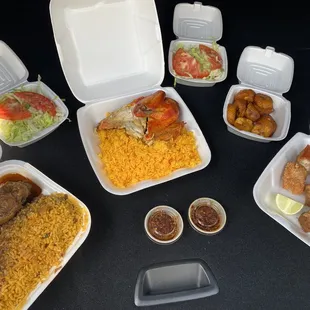 Oxtails/Rice&amp;Peas, Baked Chicken/Yellow Rice, Sweet Plantains, Side Salads, &amp; Pork Rinds with (2) side of the house hot sauce