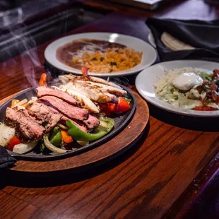 a plate of steak and vegetables