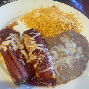 Pork tamales with red chili sauce