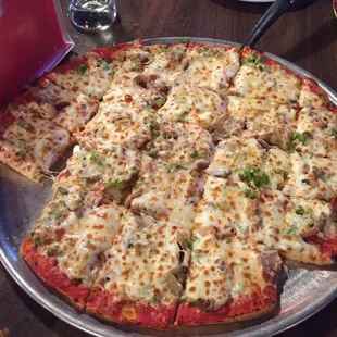 a pizza on a metal pan