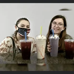 two women wearing face masks