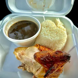 Chicken quarter lunch special with rice and beans