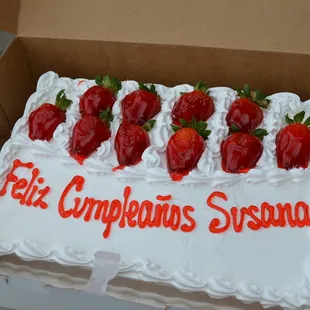 a cake with strawberries on it