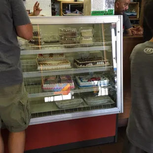 a man standing in front of the counter