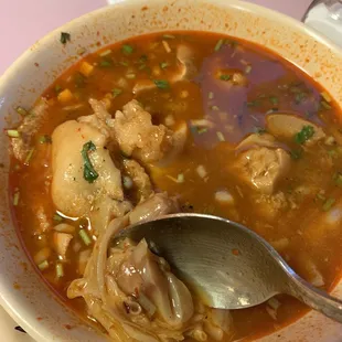 This is a menudo it was good too spicy but good and I found hair in it, you can zoom in to see them and they were stuck in the meat