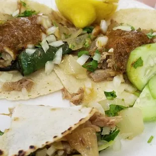 Home made tortillas, carnitas tacos