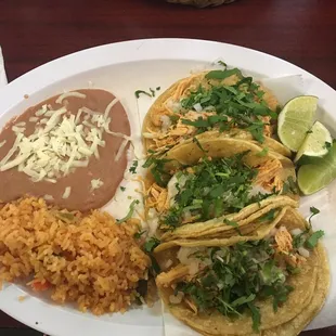 Chicken tacos, rice and beans