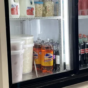 a refrigerator full of beverages