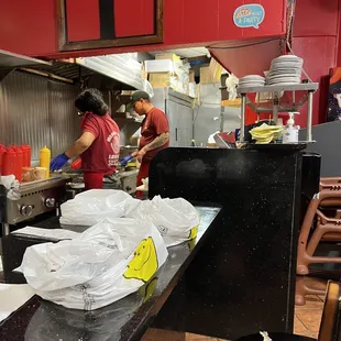 two people preparing food