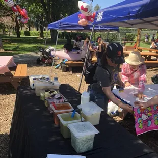 a woman serving a child