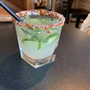 Cucumber/Jalapeno Margarita rimmed with salt and red pepper