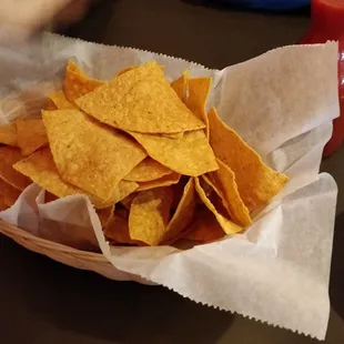 a plate of chips and a drink