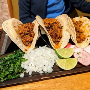 Three Tacos with Rice and Beans. $11.25. All Al Pastor. Served with corn tortillas with onions, radish, cilantro, and lime on the side.