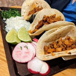 Three Tacos with Rice and Beans. $11.25. All Al Pastor. Served with corn tortillas with onions, radish, cilantro, and lime on the side.