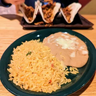 Three Tacos with Rice and Beans. $11.25. All Al Pastor. Served with corn tortillas with onions, radish, cilantro, and lime on the side.