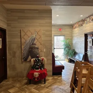 a dining room with a table and chairs
