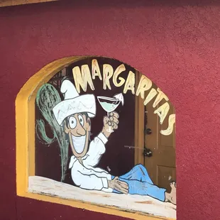 a chef in a window