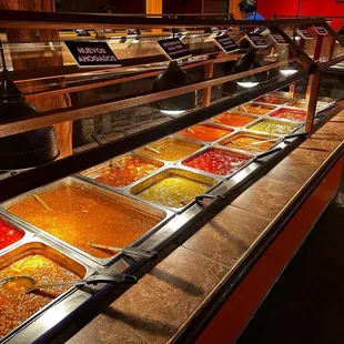 a buffet with many different types of food