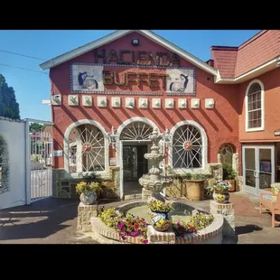 a fountain in front of a building