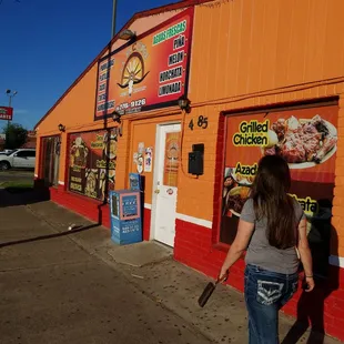 a woman walking past