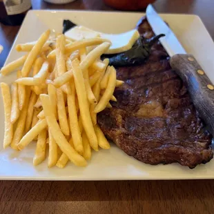 a steak and french fries