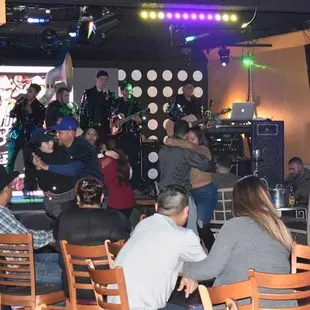 a group of people sitting at tables