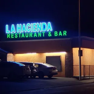 cars parked outside at night