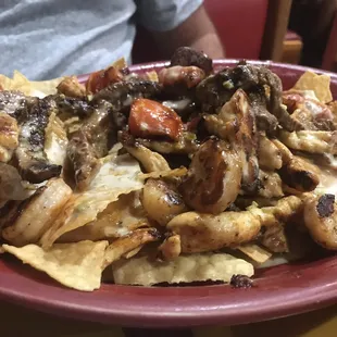 Fajita steak, Chicken, &amp; shrimp nachos