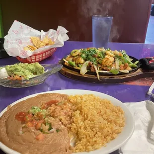 Rice refried beans &amp; sizzling chicken &amp; shrimp platter