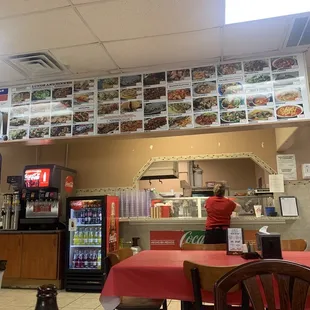 a restaurant with menus on the wall