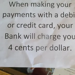 a sign on the door of a bank