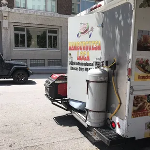 a delivery truck parked on the side of the road