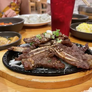 a plate of meat and rice