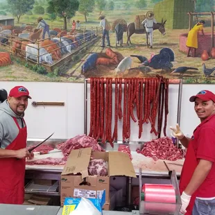 two men in a butcher shop