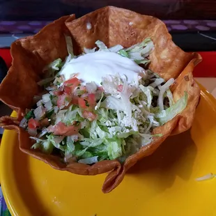 Taco salad had a crunchy shell and moist ingredients inside