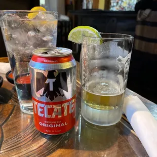 a can of tequila and a glass of lemonade