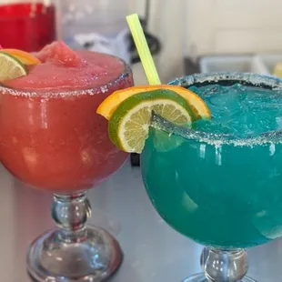 2 margaritas (left) strawberry (right) tropical