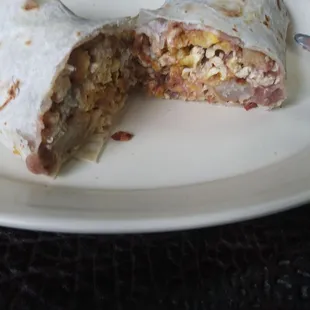 Great breakfast burrito with potato, bacon, egg, beans and cheese. So good!
