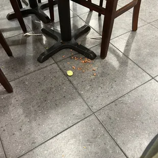 a table and chairs in a restaurant